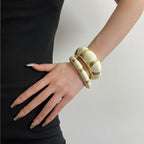 Oval Accent Cuff Bracelet with Bold Modern Contrast