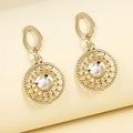 Radiant Sunburst Drop Earrings with Crystal Center
