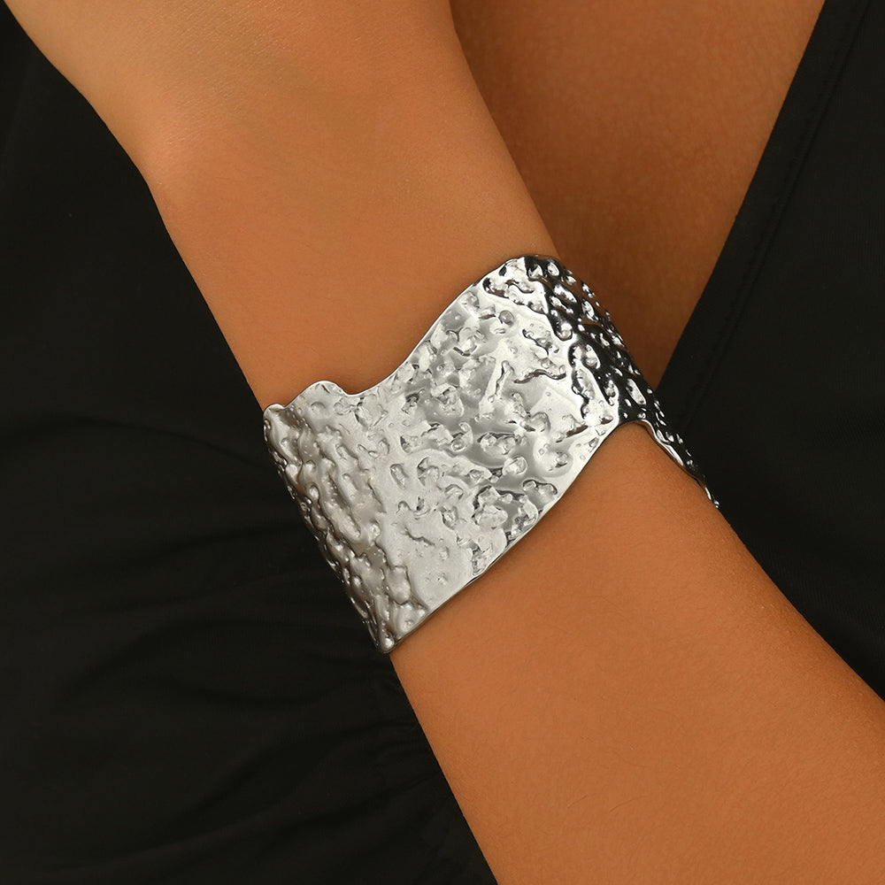 Sculptural Hammered Cuff Bracelet with Fluid Wave Design