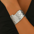 Sculptural Hammered Cuff Bracelet with Fluid Wave Design