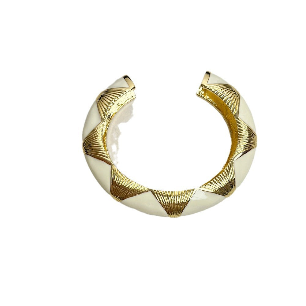 Oval Accent Cuff Bracelet with Bold Modern Contrast