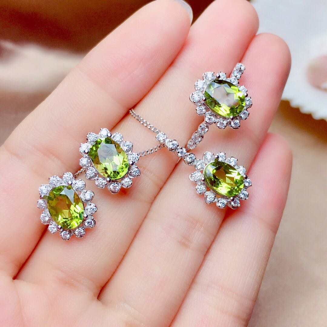 Olivine Crystal Pendant, Earrings & Ring with Sparkling Halo Design