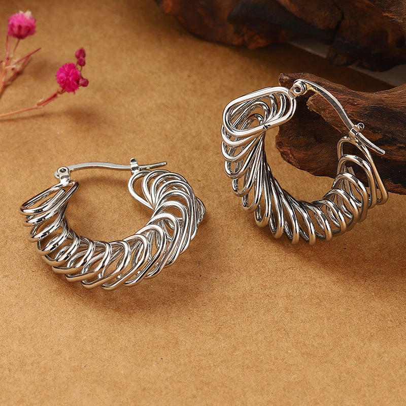 Bold Spiral Twist Hoop Earrings – Statement Clip-On Design