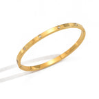 Minimalist Gold-Tone Bangle Bracelet with Crystal Accents