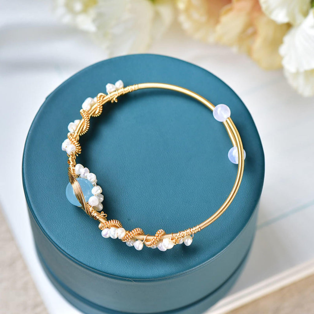 Elegant Pearl Cuff Bracelet with Center Gemstone Detail